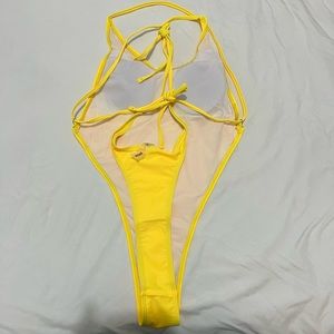 Yellow one piece with exposed back